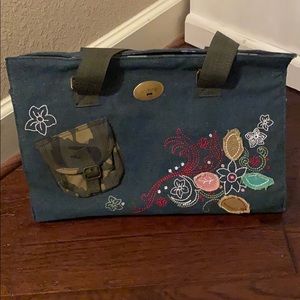 Denim and embroidered pup carrier